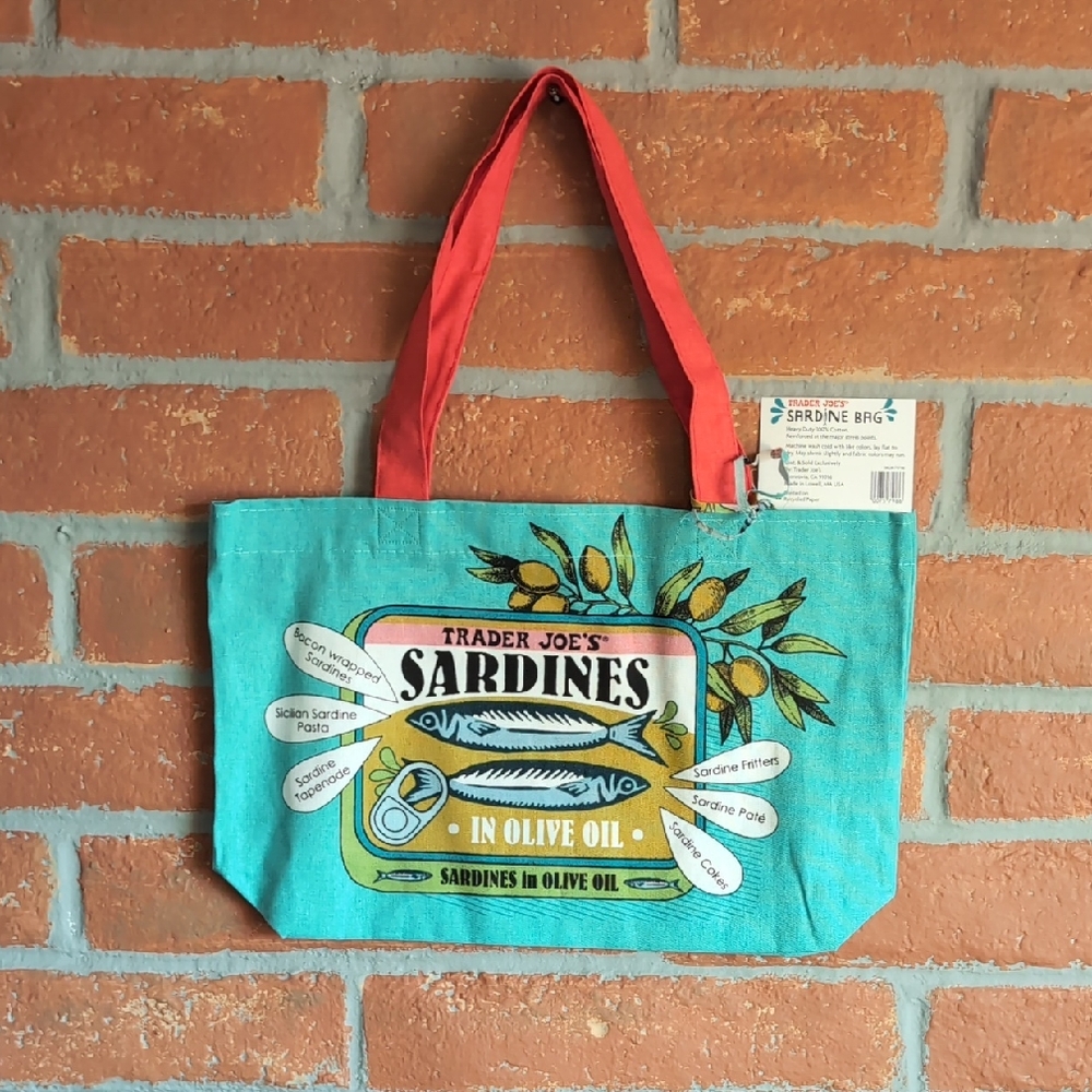 Brand-new with tag! Carry your essentials in style with this vibrant tote bag.